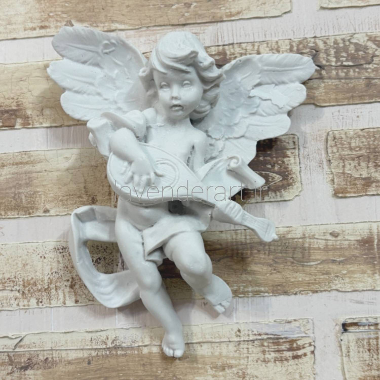 دیوارکوب پلی استر خام دارای قلاب طرح فرشته گیتاریست ابعاد 13*11 سانتی متر